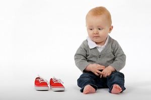 Малыш должен привыкнуть к обуви